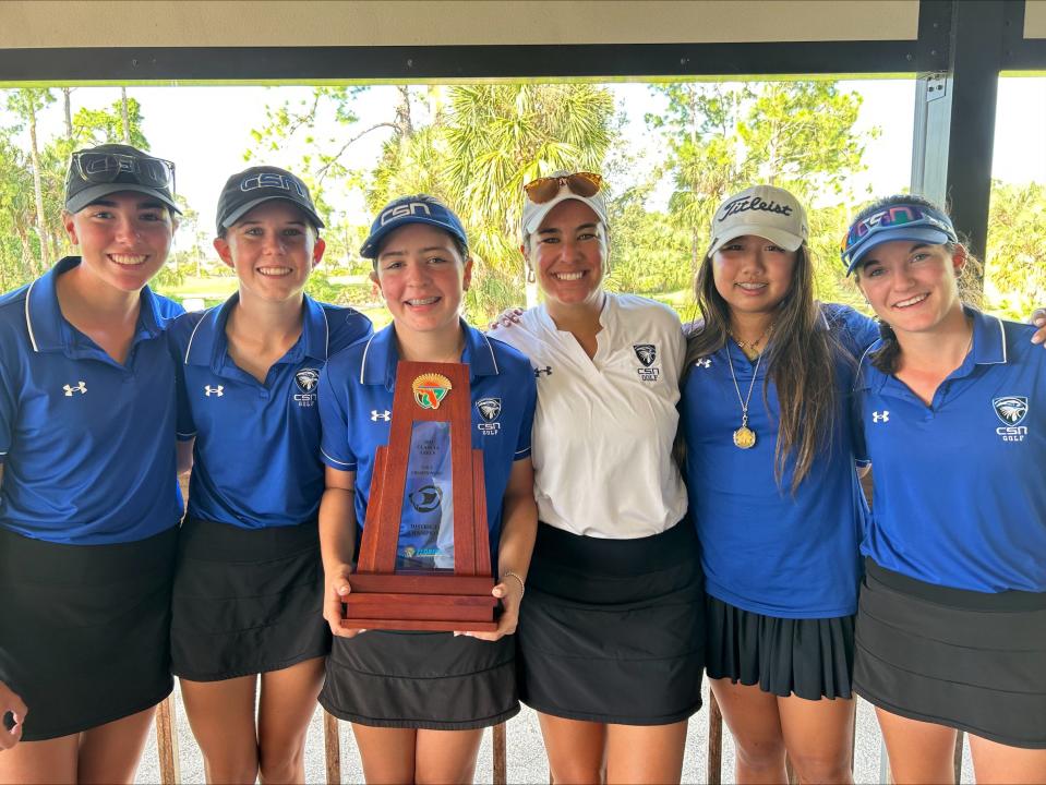 Community School of Naples poses with the Class 1A-District 12 girls golf championship trophy.