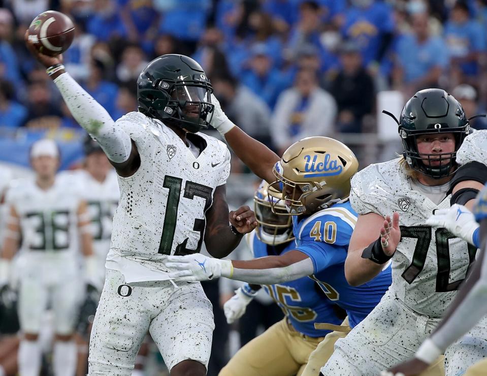 Oregon quarterback Anthony Brown throws a pass