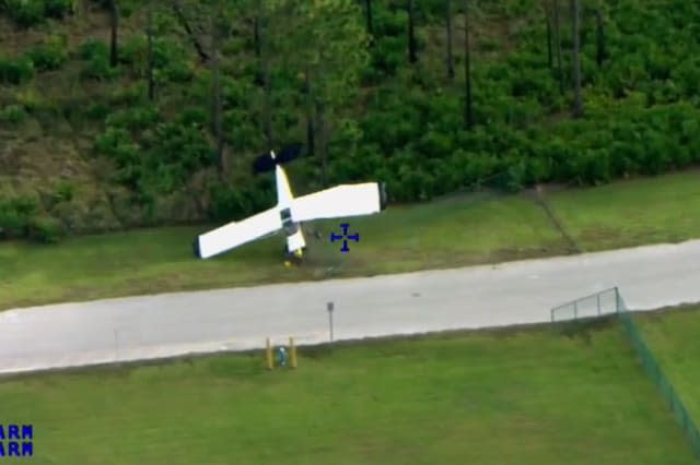 Plane crashes onto driving training course