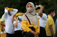 A royalist attends the gathering event to support Thailand's King Maha Vajiralongkorn in Bangkok