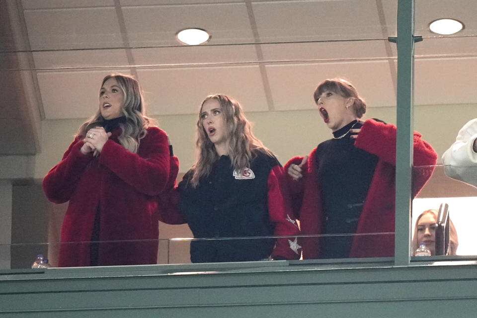 Taylor Swift, right, reacts while watching during the second half of an NFL football game between the Kansas City Chiefs and Green Bay Packers, Sunday, Dec. 3, 2023 in Green Bay, Wis. (AP Photo/Morry Gash)