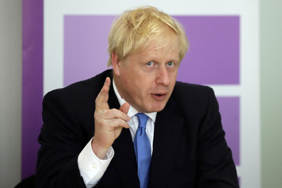 Britain's Prime Minister Boris Johnson speaks during the first meeting of the National Policing Board at the Home Office in London, Wednesday, July 31, 2019. (AP Photo/Kirsty Wigglesworth, pool)