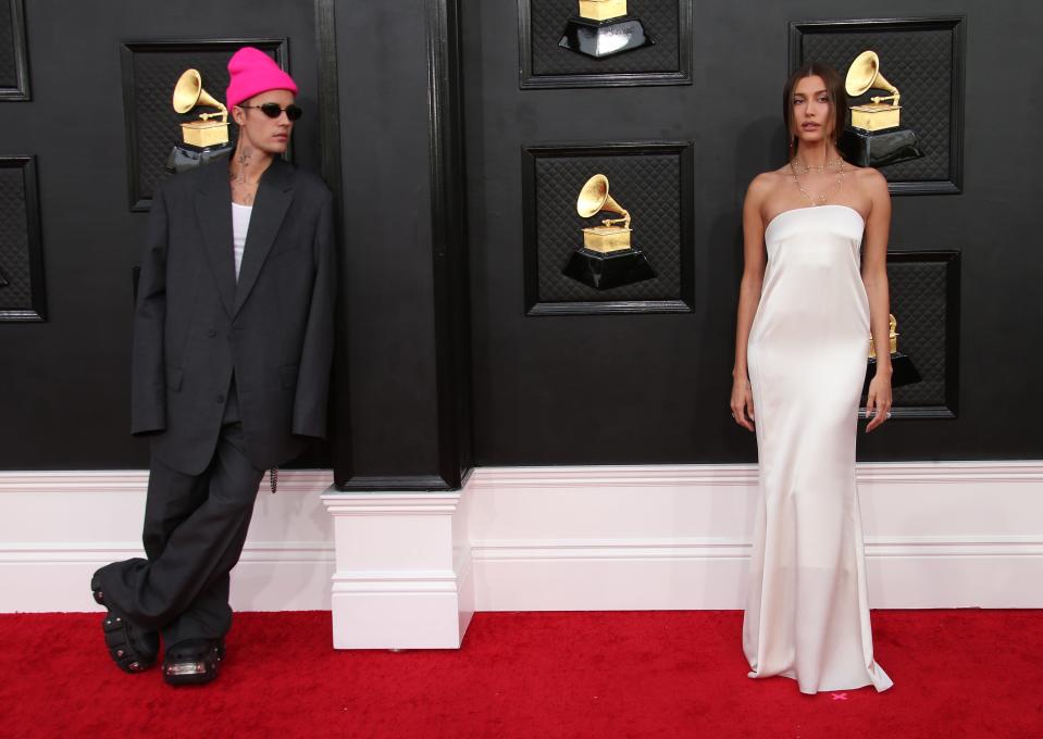 Justin and Hailey Bieber attend the 2022 Grammy Awards.