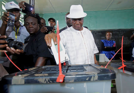 Joseph Nyuma Boakai, Liberia's vice president and presidential candidate of Unity Party (UP), votes at a polling station in Monrovia, Liberia, October 10, 2017. REUTERS/Thierry Gouegnon