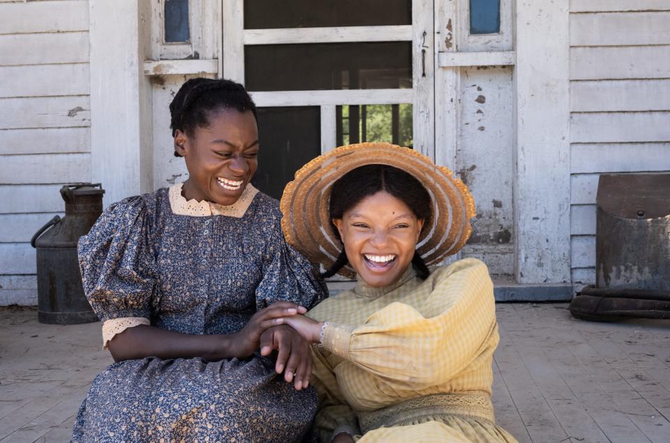 Young Celie (Phylicia Pearl Mpasi, left) and Nettie (Halle Bailey) still have their close bond in "The Color Purple."