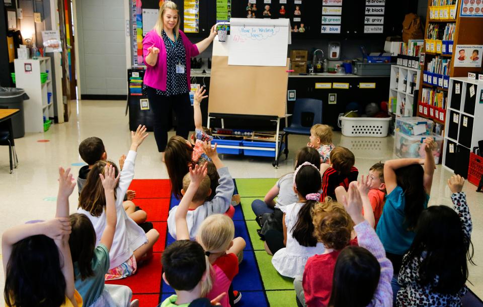 Sequiota Elementary School kindergarten teacher Rachel Hoing leads students during a writing exercise on Tuesday, April 11, 2023.