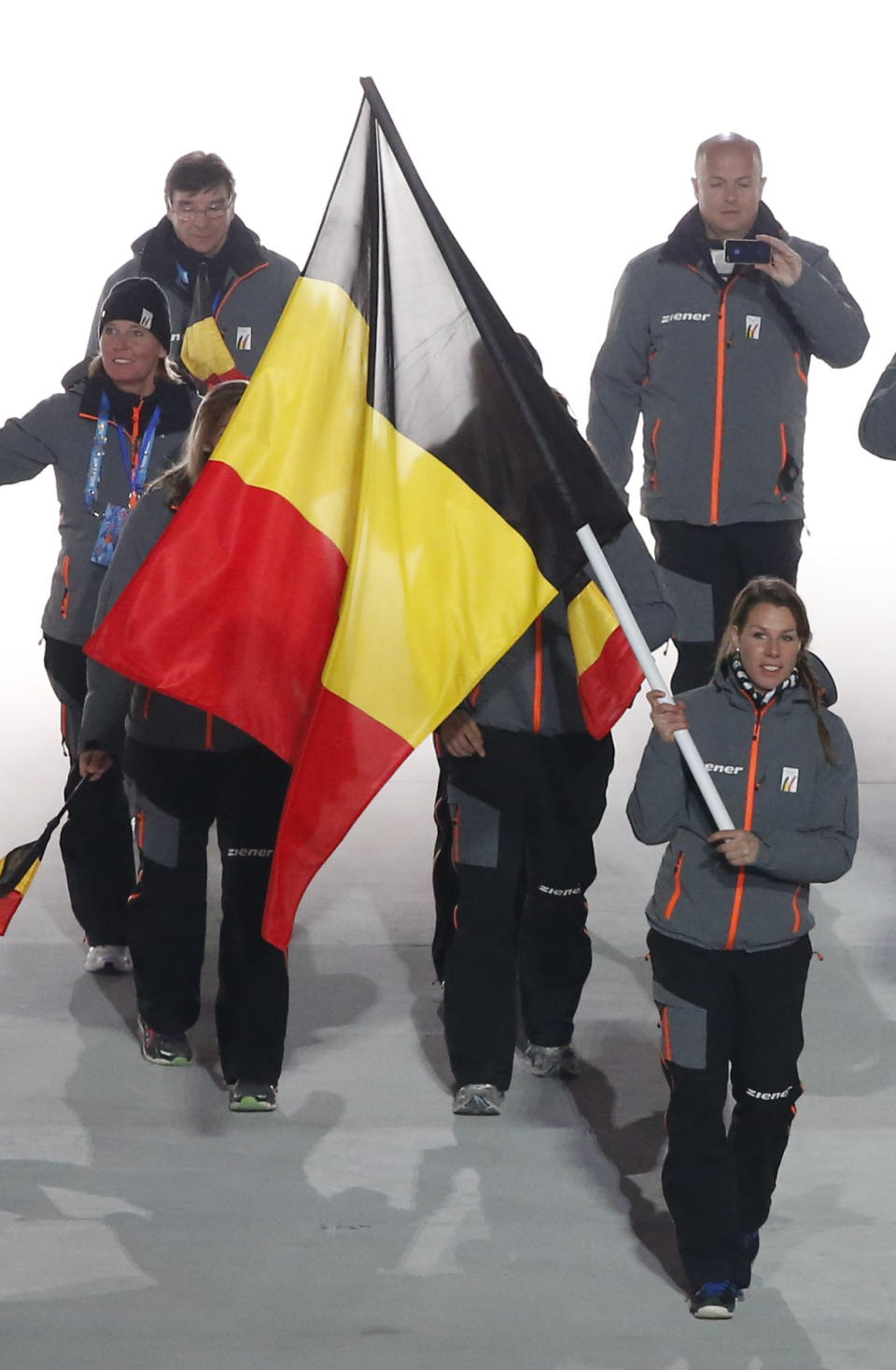 Belgium's flag-bearer Hanna Emilie Marien leads her country's contingent during the opening ceremony of the 2014 Sochi Winter Olympics, February 7, 2014. REUTERS/Lucy Nicholson (RUSSIA - Tags: OLYMPICS SPORT)