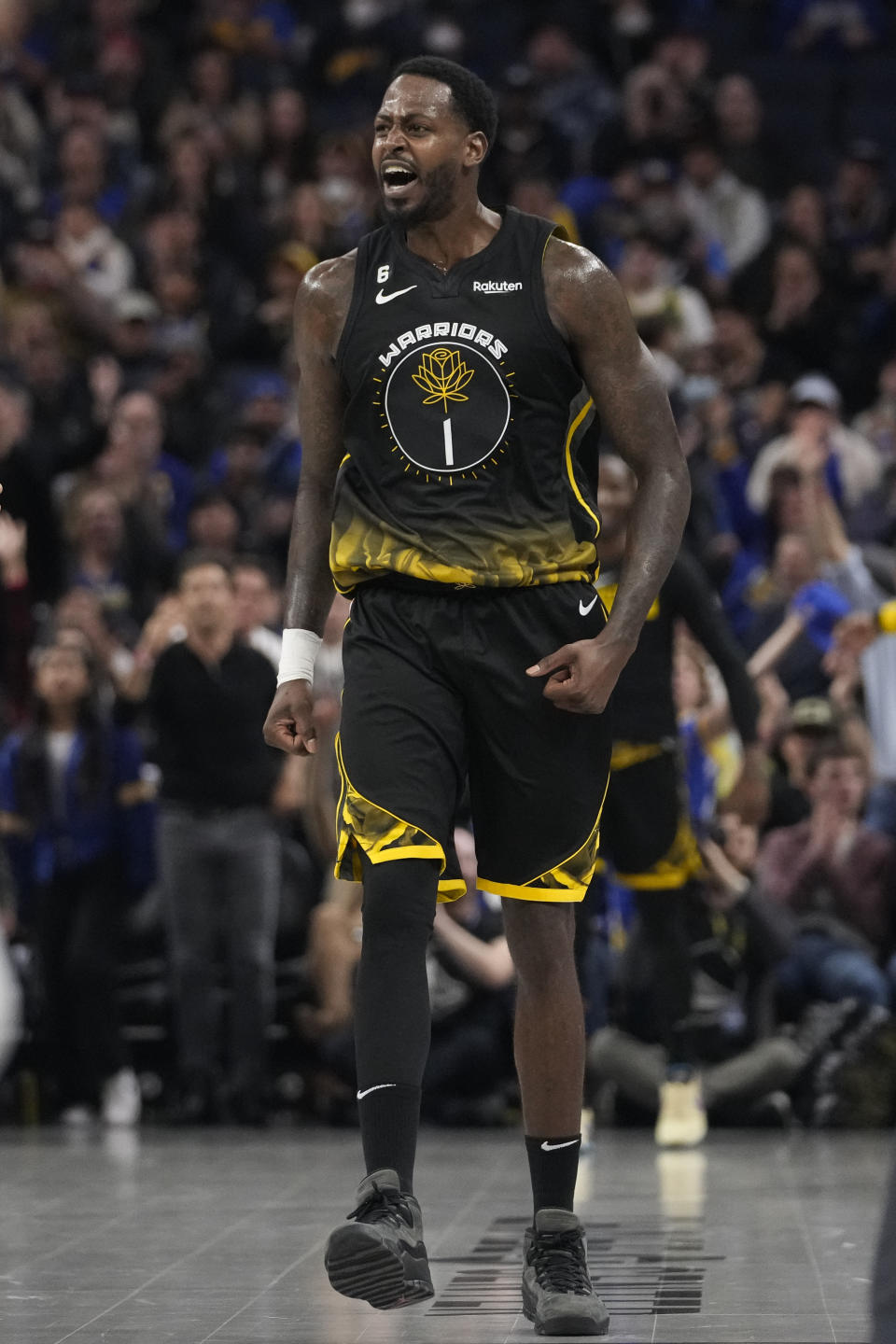 Golden State Warriors forward JaMychal Green reacts after making a 3-point basket against the New Orleans Pelicans during the first half of an NBA basketball game in San Francisco, Friday, March 3, 2023. (AP Photo/Godofredo A. Vásquez)