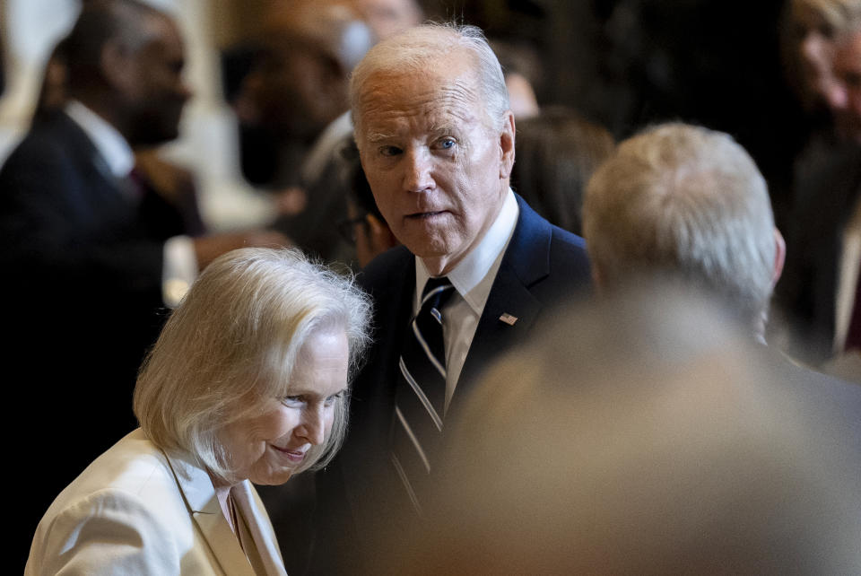 Sen. Kirsten Gillibrand, D-N.Y., left, speaks to President Joe Biden following the National Prayer Breakfast on Capitol Hill in Washington, Thursday, Feb. 1, 2024. (AP Photo/Andrew Harnik)