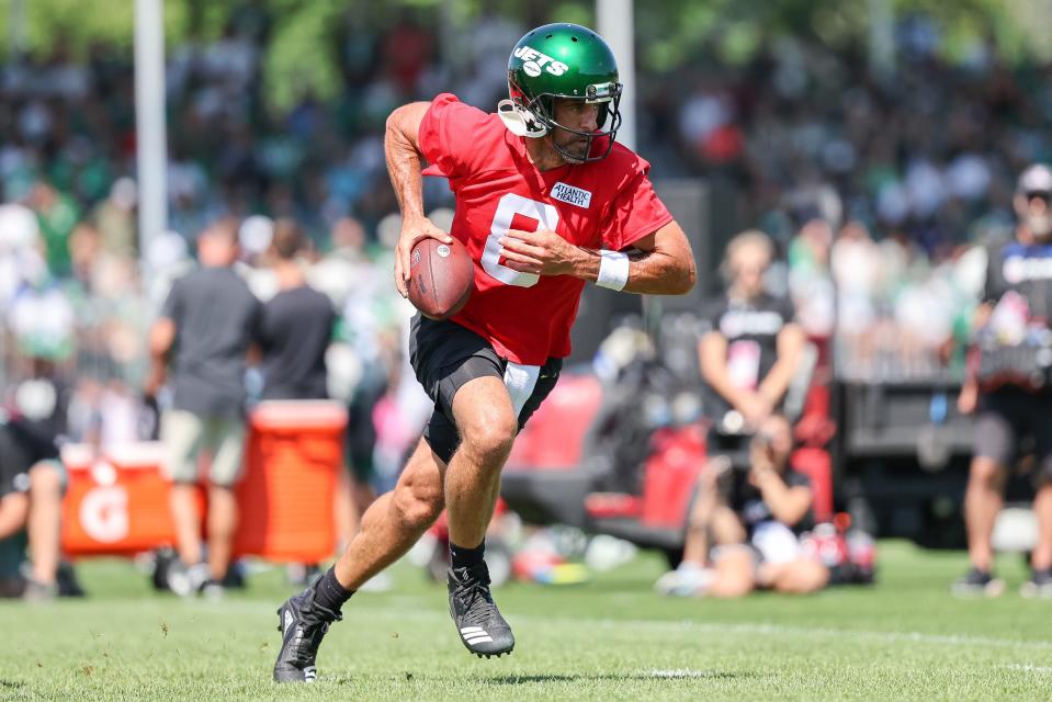 Jul 22, 2023; Florham Park, NJ, USA; New York Jets quarterback Aaron Rodgers (8) participates in drills during the New York Jets Training Camp at Atlantic Health Jets Training Center. Mandatory Credit: Vincent Carchietta-USA TODAY Sports