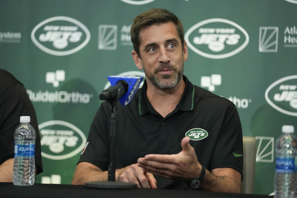 New York Jets quarterback Aaron Rodgers answers questions during an NFL football introductory press conference Wednesday, April 26, 2023, in Florham Park, N.J. (AP Photo/Seth Wenig)