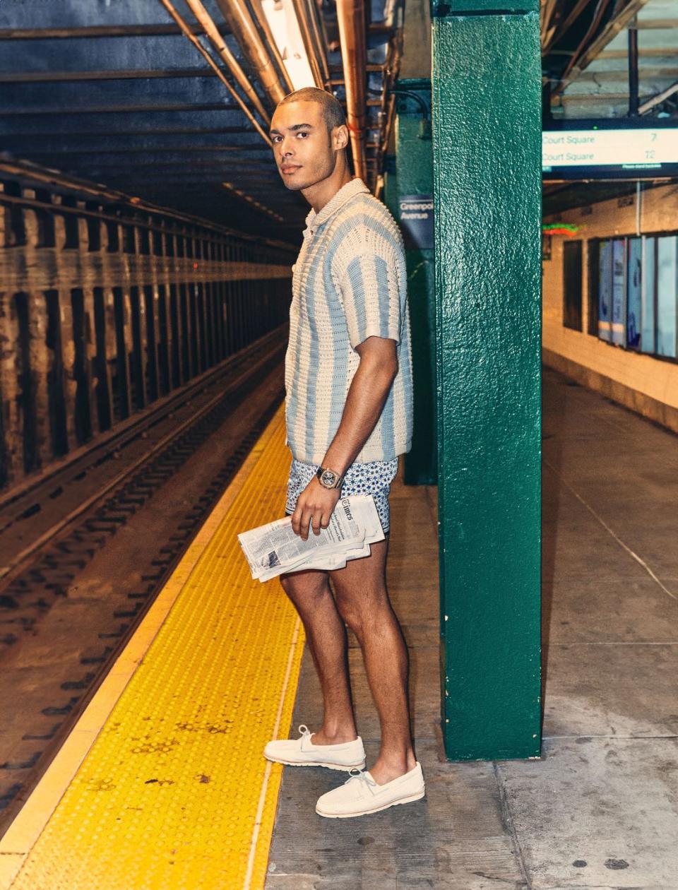 a person standing on a train platform