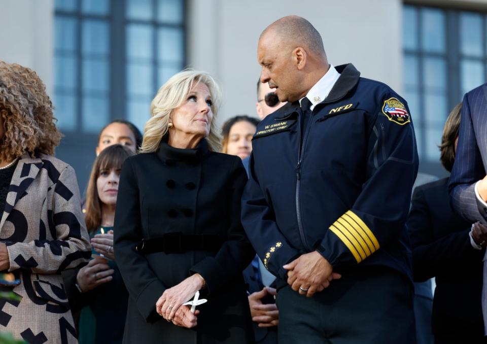 NASHVILLE, TENNESSEE - MARCH 29: First Lady of the United States Jill Biden and Nashville Fire Department Chief William Swann attend a candlelight vigil to mourn and honor the lives of the victims, survivors and families of The Covenant School on March 29, 2023 in Nashville, Tennessee. (Photo by Jason Kempin/Getty Images)