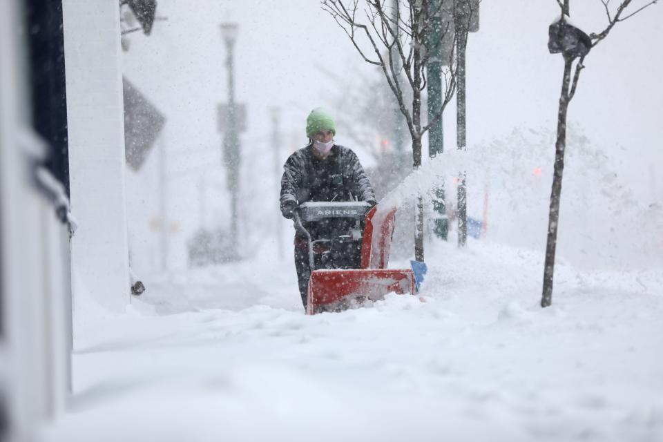 Dave Alvarez, of Carlstadt, moves snow off the sidewalk along Cedar Lane, in Teaneck, NJ, at 11:35AM. Monday, February 1,  2021