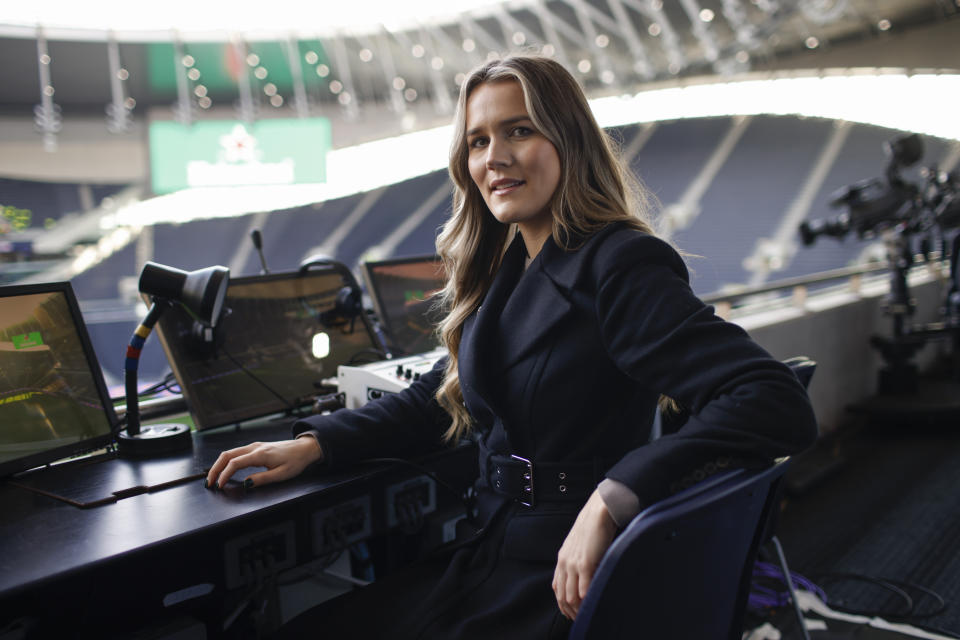 Commentator Pien Meulensteen poses for a photo ahead of the English Premier League soccer match between Tottenham Hotspur and Leeds United at the Tottenham Hotspur Stadium in London, Saturday, Nov. 12, 2022. The World Cup will sound different this year. Jacqui Oatley will become the first woman play-by-play commentator for U.S. World Cup telecasts, heading one of Fox's five broadcast teams for the tournament in Qatar that opens Sunday. Pien Meulensteen, Vicki Sparks and Robyn Cowen are among the broadcasters for matches on BBC in Britain. (AP Photo/David Cliff)