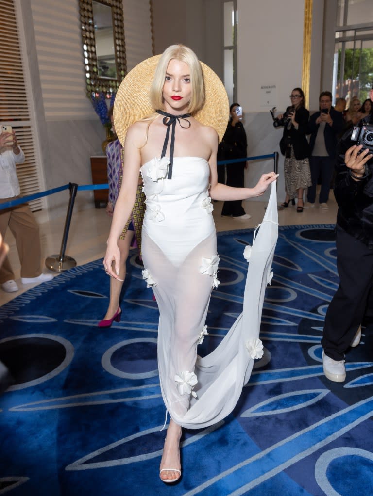 Taylor-Joy gave beachside bride vibes in her Jacquemus number during the festival. GC Images