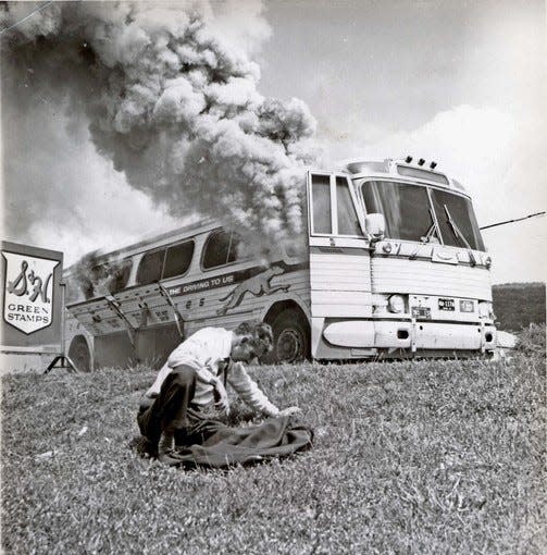 The Freedom Riders' bus was firebombed by an angry mob in Alabama.