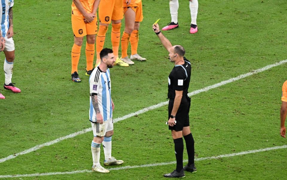 Lionel Messi #10 of Argentina receives a yellow card - Evrim Aydin/Anadolu Agency via Getty Images