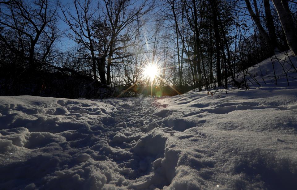 A snow-covered portion of Baird Creek Trail pictured on Jan. 7, 2022, in Green Bay, Wis.