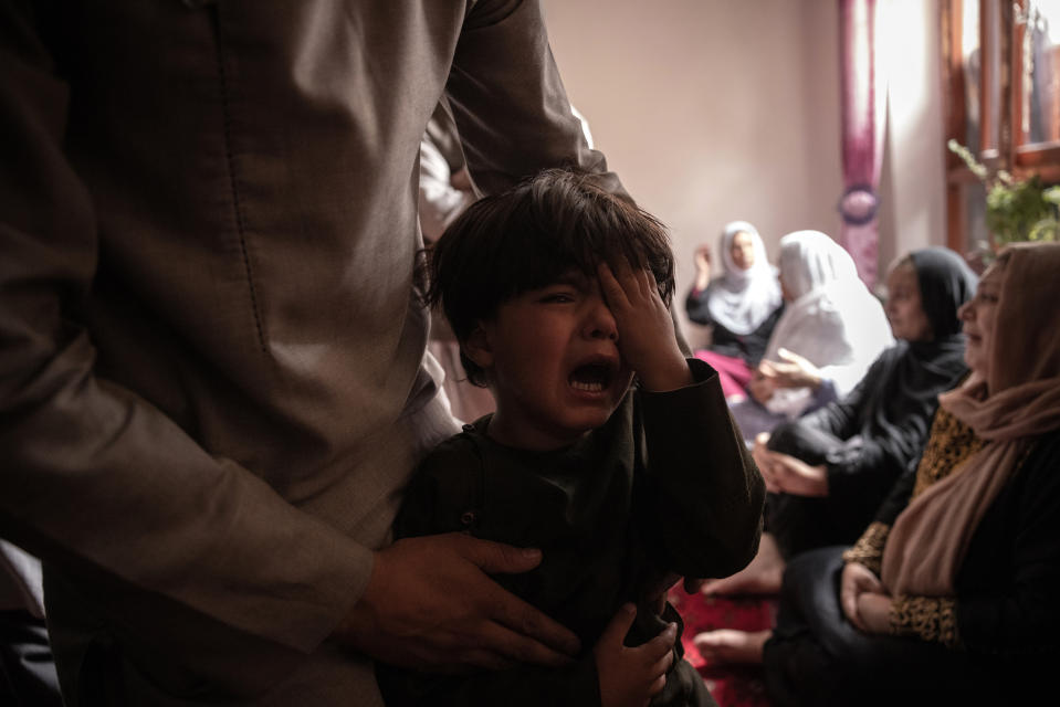 A boy cries over the death of his sister in the drone strike.<span class="copyright">Jim Huylebroek—The New York Times/Redux</span>