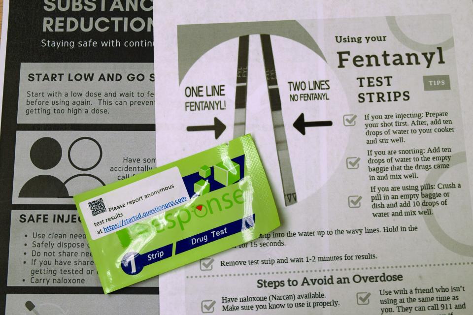 At-home fentanyl test strips, provided by the Center for Family Medicine, with informational flyers of how to use them aim to address a rise in fentanyl adulterated in local drugs supplies on Tuesday, December 14, 2021.