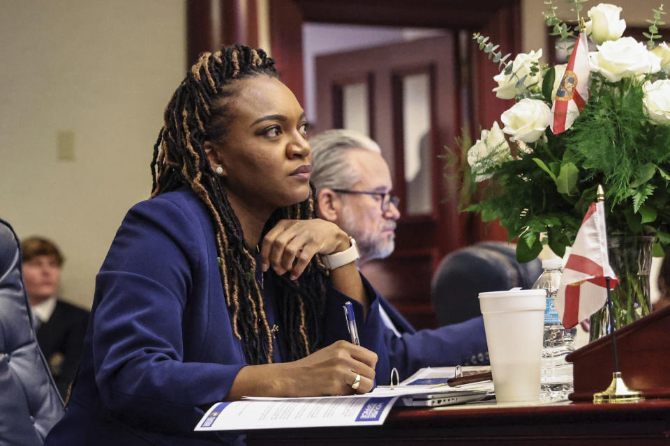 Florida House Minority Leader Fentrice Driskell, D-Tampa, listens to Gov. Ron DeSantis give his State of the State address during a joint session of the Senate and House of Representatives in Tallahassee, Fla., Tuesday, Jan. 9, 2024. Driskell thinks the ideological motive behind restricting DEI is intertwined with an economic agenda that downplays the role of identity in exacerbating inequality. (AP Photo/Gary McCullough, File)