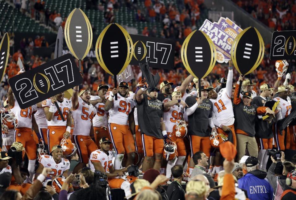 Clemson players celebrate after the NCAA college football playoff championship game against Alabama Tuesday, Jan. 10, 2017, in Tampa, Fla. Clemson won 35-31. (AP Photo/Chris O'Meara)