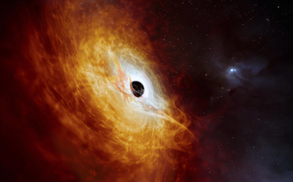 This illustration provided by the European Southern Observatory in February 2024, depicts the record-breaking quasar J059-4351, the bright core of a distant galaxy that is powered by a supermassive black hole. The supermassive black hole, seen here pulling in surrounding matter, has a mass 17 billion times that of the Sun and is growing in mass by the equivalent of another Sun per day, making it the fastest-growing black hole ever known.  (M. Kornmesser / AP)