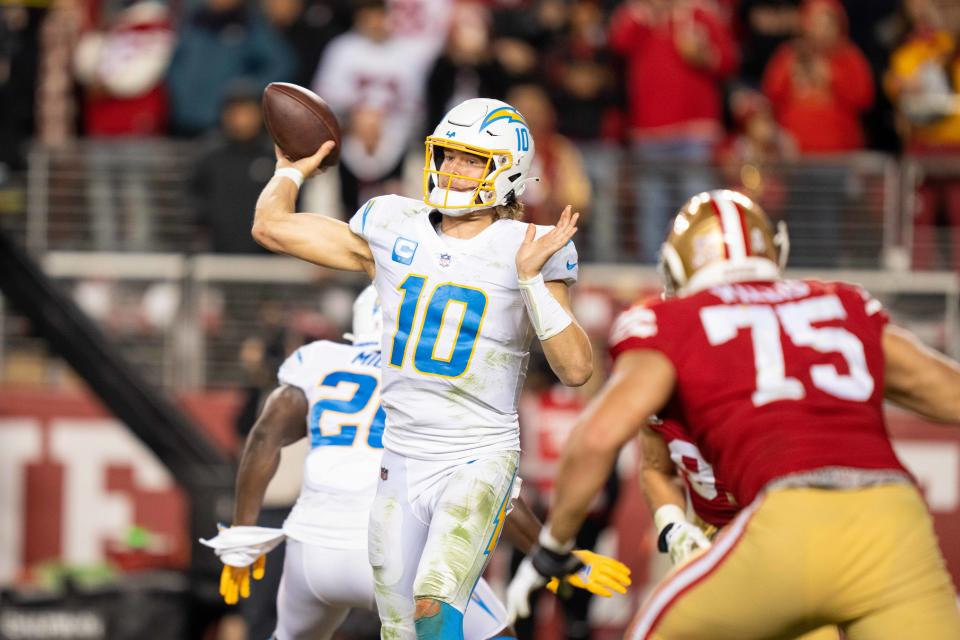 November 13, 2022; Santa Clara, California, USA; Los Angeles Chargers quarterback <a class="link " href="https://sports.yahoo.com/nfl/players/32676" data-i13n="sec:content-canvas;subsec:anchor_text;elm:context_link" data-ylk="slk:Justin Herbert;sec:content-canvas;subsec:anchor_text;elm:context_link;itc:0">Justin Herbert</a> (10) during the fourth quarter against the <a class="link " href="https://sports.yahoo.com/nfl/teams/san-francisco/" data-i13n="sec:content-canvas;subsec:anchor_text;elm:context_link" data-ylk="slk:San Francisco 49ers;sec:content-canvas;subsec:anchor_text;elm:context_link;itc:0">San Francisco 49ers</a> at Levi’s Stadium. Mandatory Credit: Kyle Terada-USA TODAY Sports