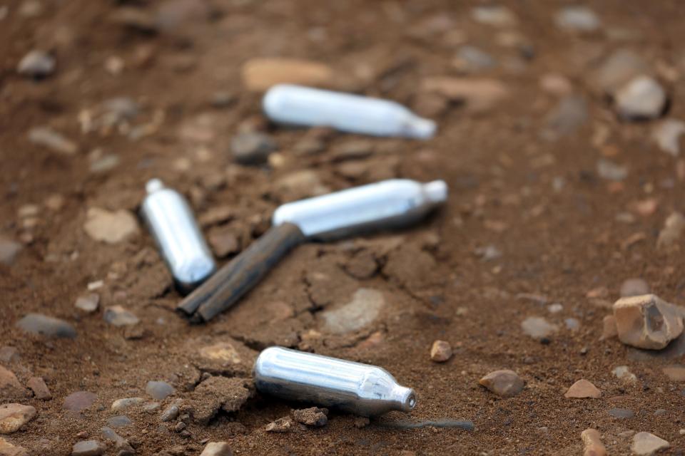 Heacham, UK. 31st Jan, 2022. Empty Nitrous oxide canisters, also known as 'Hippy Crack' on the floor at Heacham, Norfolk, UK, on January 31, 2022 Credit: Paul Marriott/Alamy Live News