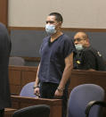 Edgar Samaniego, charged in shooting of Las Vegas police officer, appears in court at the Regional Justice Center, Friday, June 5, 2020, in Las Vegas. A prosecutor says that a 20-year-old Las Vegas man deliberately shot and gravely wounded a police officer during a Las Vegas Strip protest over the death of George Floyd, who died May 25 after being restrained by police in Minneapolis. (Bizuayehu Tesfaye/Las Vegas Review-Journal via AP)