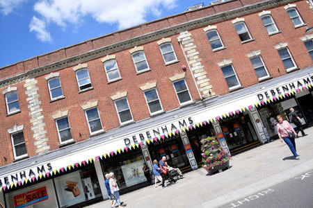 FILE PHOTO: People walk past Debenhams in Salisbury, Britain, June 22, 2018. REUTERS/Toby Melville/File Photo