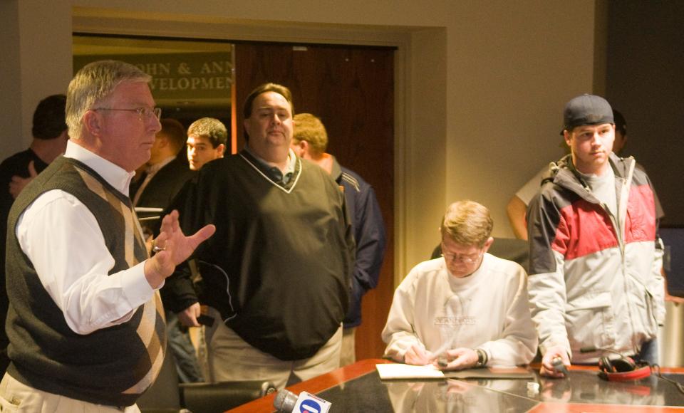 Harris D. "Bud" Ford, UT associate athletic director for media relations, dictates ground rules for coverage to reporters as Lane Kiffin prepares to announce his resignation on Tuesday, Jan. 12, 2010.