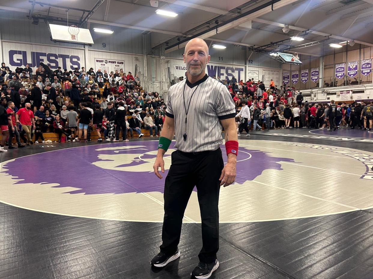 After a stellar career as a wrestler and a coach, Mike Ahern has entered a new and very unexpected phase of his career in the sport. He's in his first year as an official.