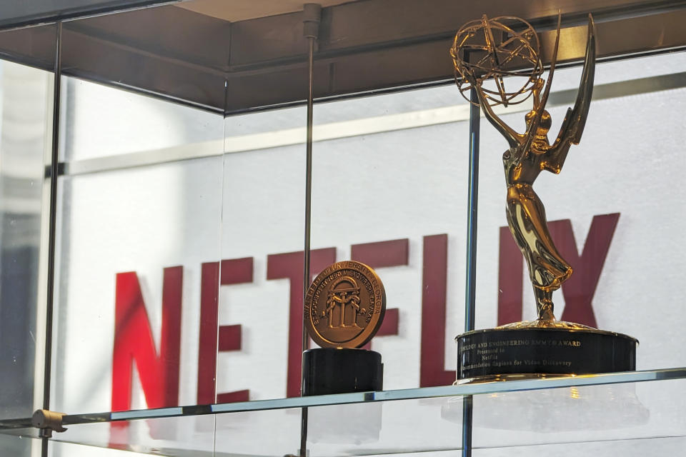 Awards, including an Emmy, are displayed at Netflix headquarters Los Gatos, Calif. on March 7, 2024. Netflix wins awards for its shows like a Hollywood studio, but still relies on the sophisticated technology of a Silicon Valley company to reel in viewers and subscribers. (AP Photo/Mike Liedtke)