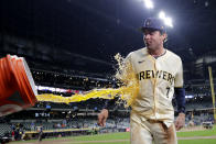 Milwaukee Brewers' Tyler Black is dunked by Willy Adames after a baseball game against the Tampa Bay Rays Tuesday, April 30, 2024, in Milwaukee. (AP Photo/Aaron Gash)