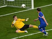 Croatian forward Nikica Jelavic (R) scores a goal against Irish goalkeeper Shay Given during the Euro 2012 football championships match Ireland vs Croatia at the Municipal Stadium in Poznan. Croatia beat the Republic of Ireland 3-1 in their Euro 2012 Group C opening match here on Sunday