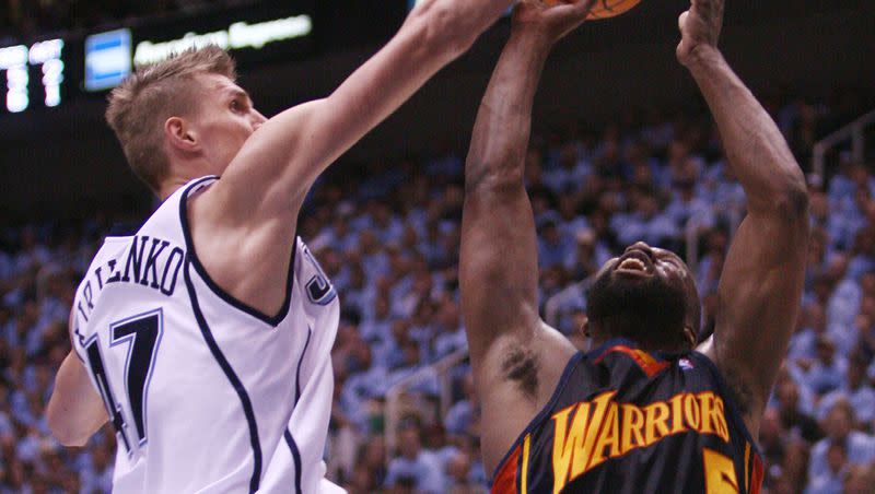 Andrei Kirilenko blocks the shot of Baron Davis during Game 2 of the Western Conference semifinals between the Utah Jazz and Golden State Warriors in Salt Lake City on Wednesday May 9, 2007.