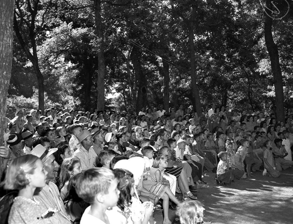 August 1941: Droves of people came to the Forest Park Zoo to see the trained animal show. Gilmore Fry’s troupe of animal actors put on their show to goggle-eyed and delighted audiences. In the show are “Buck,” the baboon, “David,” the pigtail monkey, and “Woodrow Wilson,” the spider monkey.