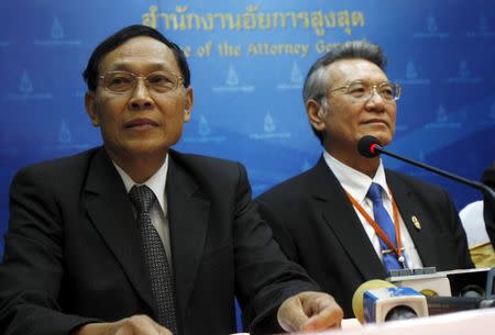 Chutichai Sakhakorn (L), Attorney Director General, Department of Special Litigation, and Surasak Threerattrakul, Director General, Department of Investigation, attend a news conference at the office of the Attorney General in Bangkok March 19, 2015. REUTERS/Chaiwat Subprasom