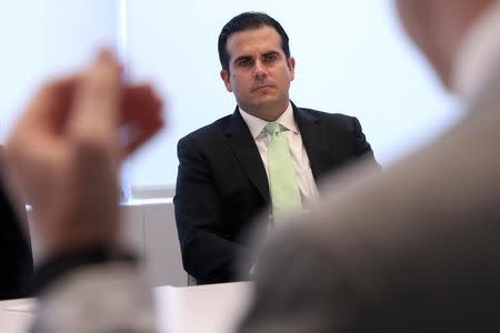 FILE PHOTO: Ricardo Rossello, Governor of Puerto Rico, listens to a question during an interview in New York, U.S., June 29, 2017. REUTERS/Shannon Stapleton