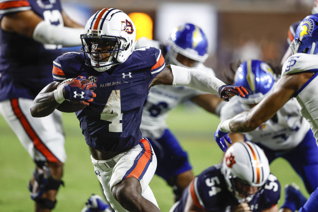 Auburn running back Tank Bigsby (4) carries the ball against San Jose State during the second half of an NCAA college football game Saturday, Sept. 10, 2022, in Auburn, Ala. (AP Photo/Butch Dill)