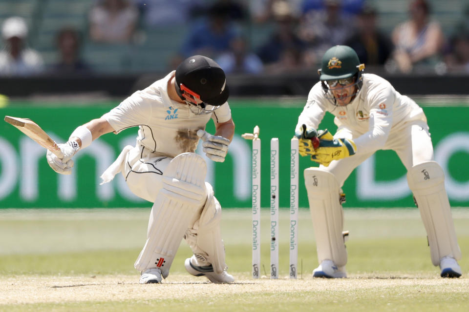 Pictured here, Tim Paine completes a stumping of Henry Nicholls in Australia's Test against New Zealand.
