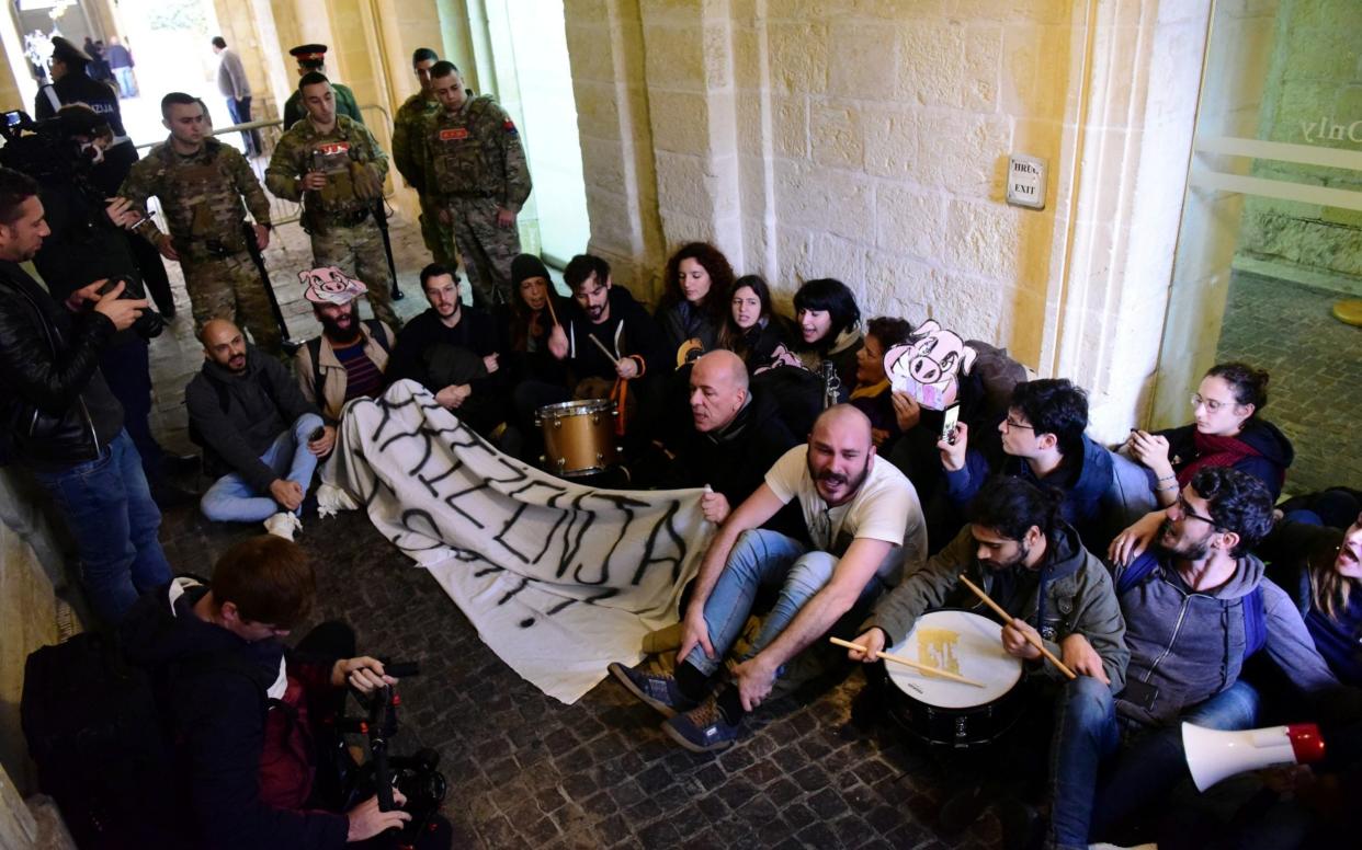 Protesters occupied an entrance of the prime minister's office in Valletta - REUTERS