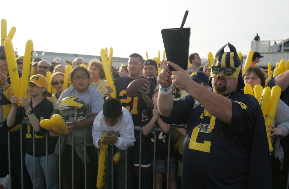 Jeff Holzhausen chanted "Go Blue" along with hundreds of fans during a rally for the 2006 Rose Bowl game at Santa Monica Pier.