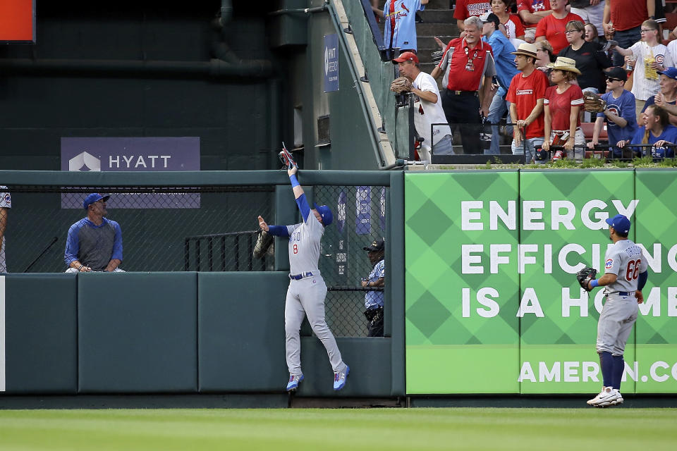 Chicago Cubs left fielder Ian Happ (8) catches a fly ball at the wall for the out on St. Louis Cardinals' Paul DeJong during the fourth inning of a baseball game Tuesday, Aug. 2, 2022, in St. Louis. (AP Photo / Scott Kane)