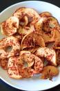 <p>Nothing could be simpler than these two-ingredient cinnamon apple chips — yes, just cinnamon and apples with no added sugar — which take merely five minutes to make. Don’t be intimidated: There's no dehydrator required.</p><p><em><a href="https://www.trialandeater.com/cinnamon-apple-chips/" rel="nofollow noopener" target="_blank" data-ylk="slk:Get the recipe from Trial and Eater »;elm:context_link;itc:0;sec:content-canvas" class="link ">Get the recipe from Trial and Eater »</a></em></p>