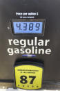 The price for regular gasoline is shown ahead of the Fourth of July weekend, at a Costco gas station, Thursday, June 30, 2022, in North Miami, Fla. (AP Photo/Wilfredo Lee)