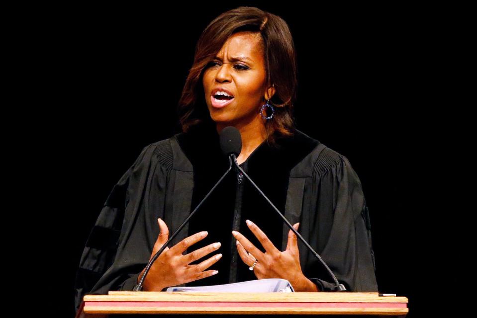 First lady Michelle Obama delivers the commencement address to graduates of Dillard University in New Orleans, Saturday, May 10, 2014. (AP Photo/Jonathan Bachman)