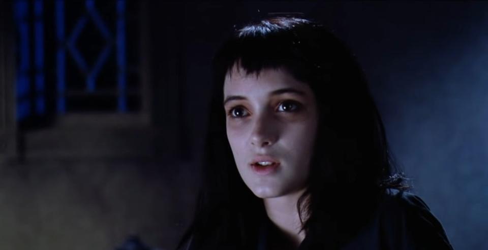 closeup of Winona with dark hair and short bangs